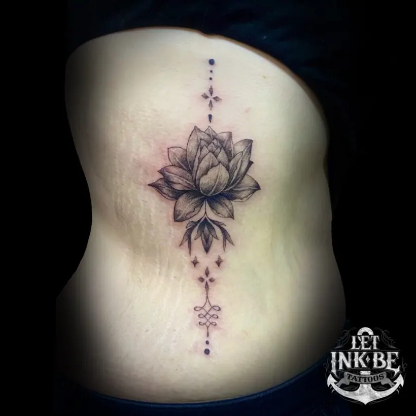 fine line tattoo lotus bloem